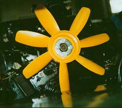 Fan with clamping ring and bolts